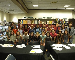 Neighbors | Zack Shively.Fourth-grade students at Robinwood Lane Elementary gave presentations at Barnes and Noble on June 4. They presented the children's books that they wrote during the school year. Pictured are Doreen Miner, Janice Zorman and their fourth-grade intervention classes.
