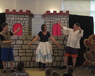 Neighbors | Zack Shively.The Madcap Puppets invited a mother up to the front to take on the role of Rose, the character in Rumpelstiltskin who spins straw into gold after making a deal with the titular character. The performers used British accents, which she returned in her lines in the play.