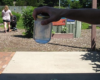 Neighbors | Zack Shively.Mill Creek MetroPark's Family Fun Friday includes a different theme each week. On June 15, they used the theme of weather. They provided activities where the children made clouds and spun a jar to make a tornado shape in the water.