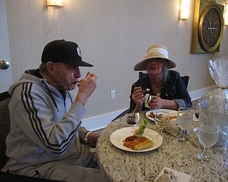 Neighbors | Zack Shively.The Inn at Poland Way provided the fathers and their guests with pizza and wings for their Father's Day meal. After the meal, they gave the residents ice cream to make their own sundaes. Pictured, Mowry Young and his daughter Deborah Young enjoyed their ice cream.