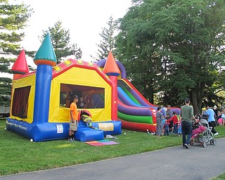 Neighbors | Jessica Harker.A bounce house and slide were set up by Boardman Bounce for the Family Night in the park event on June 30.
