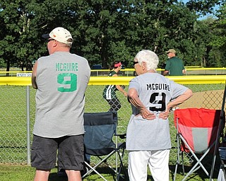 Neighbors | Jessica Harker.David and Marcy McGuire sported matching jerseys representing Katie McGuire, number 19, on the Austintown Girls Green team 18 U division, during the Jessica Morehead memorial tournament on July 7.