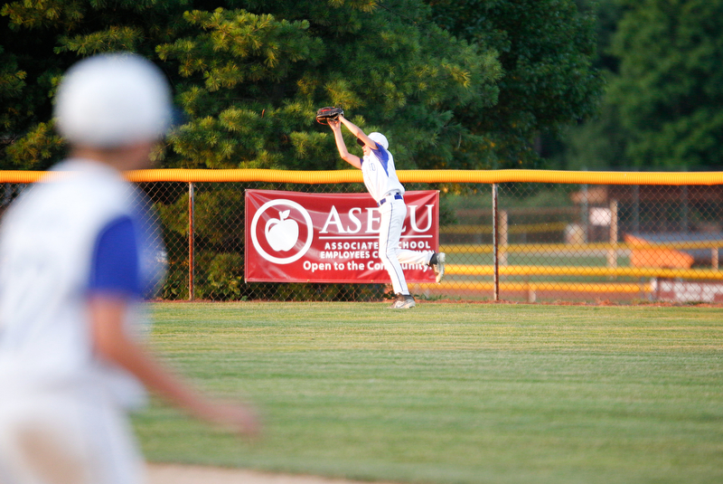 Poland's Danny Nitolli catches a ball in center field during the third inning of the 12u district championship game against Boardman at Field of Dreams in Boardman on Thursday.