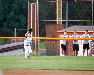 Poland's Dom Elia goes after a ball during the third inning of the 12u district championship game against Boardman at Field of Dreams in Boardman on Thursday.