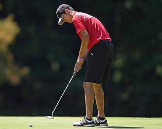 HERMITAGE, PENNSYLVANIA - JULY 12, 2018: Dante Flak of Canfield follows his putt on the eighth hole, Thursday afternoon during the Vindy Greatest Golfer tournament at Tam O'Shanter in Hermitage. DAVID DERMER | THE VINDICATOR