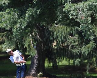 HERMITAGE, PENNSYLVANIA - JULY 12, 2018: Anthony Clark from Bristolville follows his approach shot on the 15th hole, Thursday afternoon during the Vindy Greatest Golfer tournament at Tam O'Shanter in Hermitage. DAVID DERMER | THE VINDICATOR