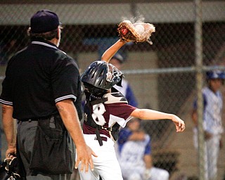 Boardman's Cal Huston catches a pop-up during the 12u championship game against Poland at Field of Dreams on Friday.