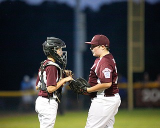 Boardman's Cal Huston, left, and Ryan Conti talk during the 12u championship game against Poland at Field of Dreams on Friday.