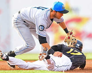 NILES, OHIO - JULY 14, 2018: Mahoning Valley Scrappers' Richard Palacios is tagged out by Chris Betts after attempting to steal first base in the first inning of a baseball game, Saturday, July 14, 2018, in Niles. Renegades won 1-0. DAVID DERMER | THE VINDICATOR