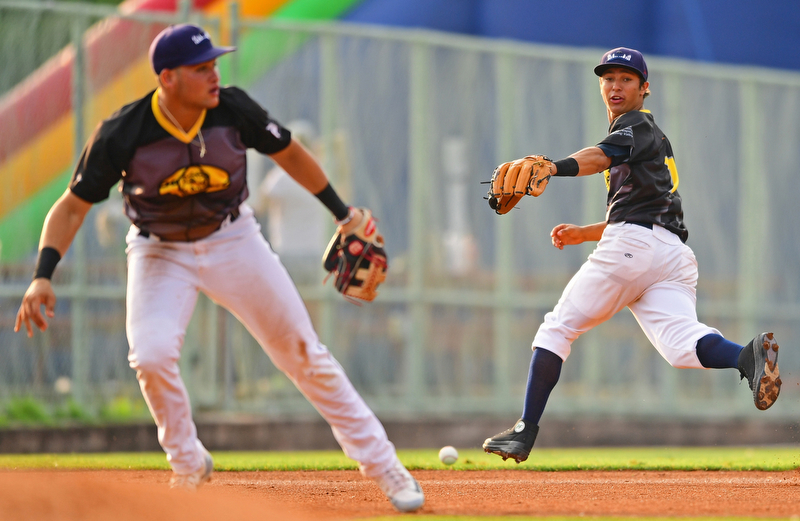 NILES, OHIO - JULY 14, 2018: Mahoning Valley Scrappers' Tyler Freeman, right, chases after a ball misplayed by Henry Pujols in the second inning of a baseball game against the Hudson Valley Renegades, Saturday, July 14, 2018, in Niles. Renegades won 1-0. DAVID DERMER | THE VINDICATOR
