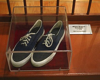 This undated image provided by the Children's Museum of Pittsburgh shows sneakers worn by Fred Rogers, host of the old PBS children's television show "Mister Rogers' Neighborhood." The shoes are among a number of items from the show on display at the museum. The museum is part of the Fred Rogers Trail being promoted by Pennsylvania tourism officials on the 50th anniversary of the show's 1968 launch. A new documentary called "Won't You Be My Neighbor?" has also rekindled interest in Rogers' legacy. (Children's Museum of Pittsburgh via AP)
