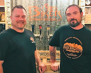 Biker Brewhouse owner Larry Wilson and brewer Lyle Valentich have the only brewery inside a Harley-Davidson dealership anywhere.