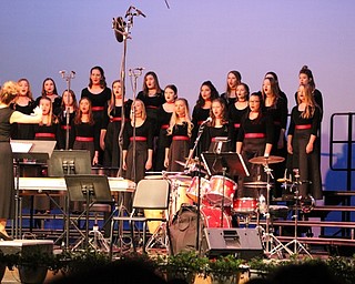 Neighbors | Abby Slanker.The One Octave higher choir, under the direction of Kelly Scurich, performed during the school’s choir concert on May 24.