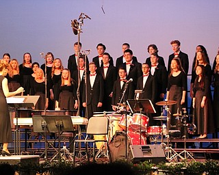 Neighbors | Abby Slanker.The Canfield chamber ensemble performed “Wana Baraka,” a Kenyan folk song arranged by Shawn L. Kerchner, under the direction of Kelly Scurich.