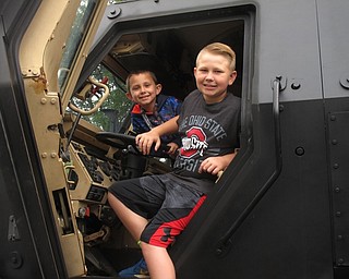 Neighbors | Zack Shively.Boardman's administration had their 13th annual Community Day for the township on June 2. Part of the celebration took place in the parking lot of the administration building, where they had numerous emergency vehicles set up for families to learn about. Pictured, Daniel and Zackery Johnson got a chance to sit in one of the SWAT team's vehicles.