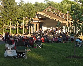 Neighbors | Zack Shively.The Boardman jazz ensemble 2's 2k18 performance at Boardman Park allowed the students to perform a rock concert on the final day of school. The group organized their rock repertoire during the school year for basketball games. Pictured, they mixed together than normal style of music, jazz, with the rock genre for Reel Big Fish's ska song "Sell Out."