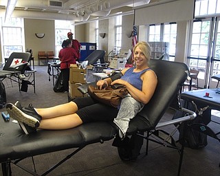 Neighbors | Jessica Harker .Adrienne Neff waited to get her blood drawn at the June 20 blood drive at the Poland library.