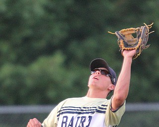 William D. Lewis The Vindicator  Baird's Jacob McCaskey(21) catches a fly ball during 1rst inning of 7-19-18 game with Troy at Cene.