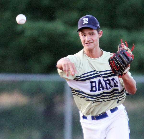 William D. Lewis The Vindicator  Baird's SS Luke Stauffer(7) throws to 1rst during 7-19-18 game with Troy at Cene.