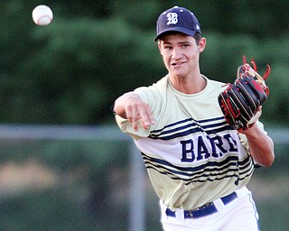 William D. Lewis The Vindicator  Baird's SS Luke Stauffer(7) throws to 1rst during 7-19-18 game with Troy at Cene.