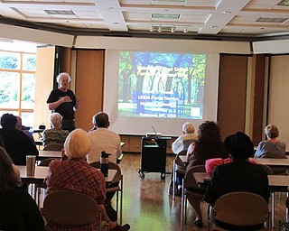 Neighbors | Jessica Harker.Jim Chatfield lectured at Fellows Riverside Garden about urban trees on July 11.