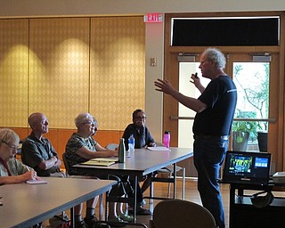 Neighbors | Jessica Harker.Jim Chatfield lectured at Fellows Riverside Garden about urban trees on July 11.