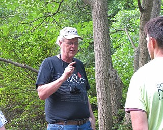 Neighbors | Jessica Harker.On July 11, Jim Chatfield lectured outside about the importance of urban trees at Mill Creek park.