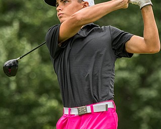 DIANNA OATRIDGE | THE VINDICATOR Jake Sylak from Mineral Ridge tees off on Hole No. 9 during the final round of the Greatest Golfer junior tournament at Avalon Lakes in Howland on Saturday.