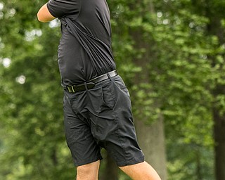 DIANNA OATRIDGE | THE VINDICATOR Cole Christman, from Boardman, watches his tee shot during final round of the Greatest Golfer junior tournament at Avalon Lakes in Howland on Saturday.