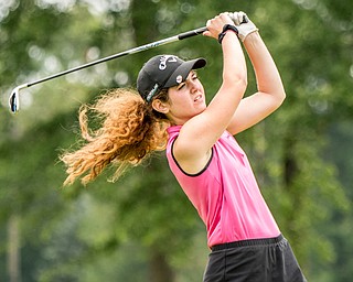 DIANNA OATRIDGE | THE VINDICATOR Eileen McHale, from Canfield, watches her Par 3 tee shot during final round of the Greatest Golfer junior tournament at Avalon Lakes in Howland on Saturday.