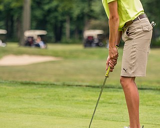 DIANNA OATRIDGE | THE VINDICATOR Rocco Turner, from Poland, watches his putt during the final round of the Greatest Golfer junior tournament at Avalon Lakes in Howland on Saturday.