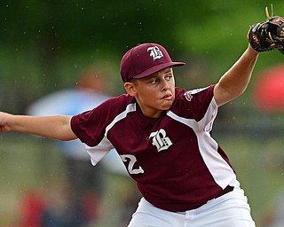 NORTH CANTON, OHIO - JULY 22, 2018: Boardman starting pitcher Gavin Hyde delivers in the fifth inning of a Little League baseball game, Sunday night in North Canton. DAVID DERMER | THE VINDICATOR