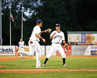 Tyler Freeman, right, and Henry Pujols celebrate after holding the Cyclones 0-1 in the fourth inning of Tuesday night's game.