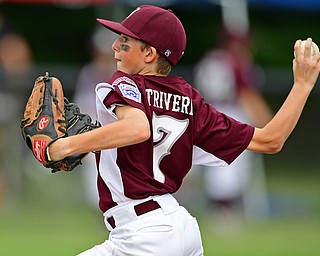 NORTH CANTON, OHIO - JULY 24, 2018: Boardman starting pother Anthony Triveri delivers in the second inning of a Little League baseball game, Tuesday night in North Canton. DAVID DERMER | THE VINDICATOR