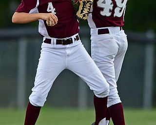 NORTH CANTON, OHIO - JULY 24, 2018: Boardman's Charlie Young, right, and Marty Stachowicz celebrate after Boardman defeated Ironton 18-0 in a League baseball game, Tuesday night in North Canton. DAVID DERMER | THE VINDICATOR