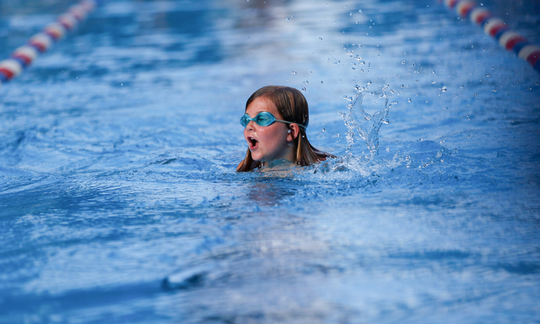 Rylynne Scriber, 6, with BTSC, competes in the 25Y Freestyle during the swim meet between Applewood Swim Club and Boardman Tennis and Swim Club at the Applewood Swim and Tennis Club on Wednesday.