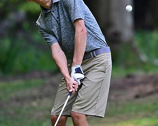 BOARDMAN, OHIO - JULY 25, 2018: Zavier Bokan of McDonald follows his approach from the rough on the 9th hole, Wednesday morning during the Independent Insurances Agents of Mahoning County Junior Golf Classic at Mill Creek Golf Course. DAVID DERMER | THE VINDICATOR