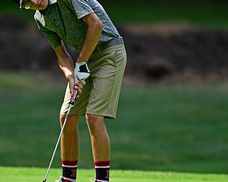 BOARDMAN, OHIO - JULY 25, 2018: Zavier Bokan of McDonald follows his putt on the 9th hole, Wednesday morning during the Independent Insurances Agents of Mahoning County Junior Golf Classic at Mill Creek Golf Course. DAVID DERMER | THE VINDICATOR