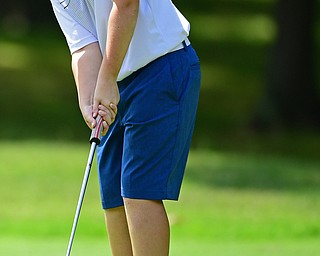 BOARDMAN, OHIO - JULY 25, 2018: Ryan Sam of Boardman follows his putt on the eighth hole, Wednesday afternoon during the Independent Insurances Agents of Mahoning County Junior Golf Classic at Mill Creek Golf Course. DAVID DERMER | THE VINDICATOR