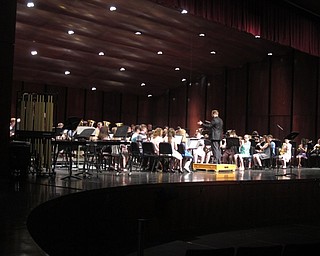 Neighbors | Zack Shively.The seventh-grade band closed out the spring concert. They began their performance with "Above and Beyond," pictured, and closed out the show with "Madcap Mallet Mania."