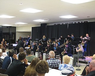 Neighbors | Zack Shively.Boardman's jazz ensemble 1 opened and closed the spring jazz concert with sets of five songs. Their songs from the night included music from everyone from Michael Buble to Dizzy Gillespie to Kermit the Frog. Pictured, they ended the concert with a medley of Stevie Wonder songs with Becca Choleva on vocals.
