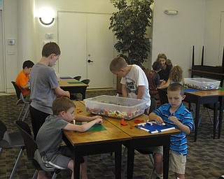 Neighbors | Jessica Harker.Several children attended the Lego at the library event including, from left, (back) Noah Friedman, Zach Hans; (front) Liam Friedman and Nico Hans.