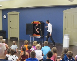 Neighbors | Natalie Wright.For the final trick, magician and illusionist David Anthony's assistant climbed into a box into which rectangular tubes were then placed, filling the space within the box completely. The top and lower halves of the box were also separated from one another during the trick.