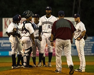 DIANNA OATRIDGE | THE VINDICATOR The Mahoning Valley Scrappers gather on  the mound during their game versus the Brooklyn Cyclones on Thursday at Eastwood Field in Niles.