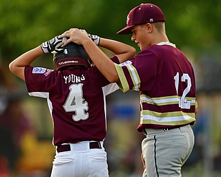 NORTH CANTON, OHIO - JULY 26, 2018: Boardman's Charlie Young is consoled by New Albany's Max Purper after of a Little League baseball game, Thursday night in North Canton. New Albany won 3-1. DAVID DERMER | THE VINDICATOR