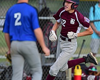 NORTH CANTON, OHIO - JULY 17, 2018: Boardman's Jack Ericson comes home to score after hitting a inside the park home run off Hamilton starting pitcher Jonathan Alcorn in the fifth inning of a Little League baseball game, Friday night in North Canton. Boardman won 5-4. DAVID DERMER | THE VINDICATOR