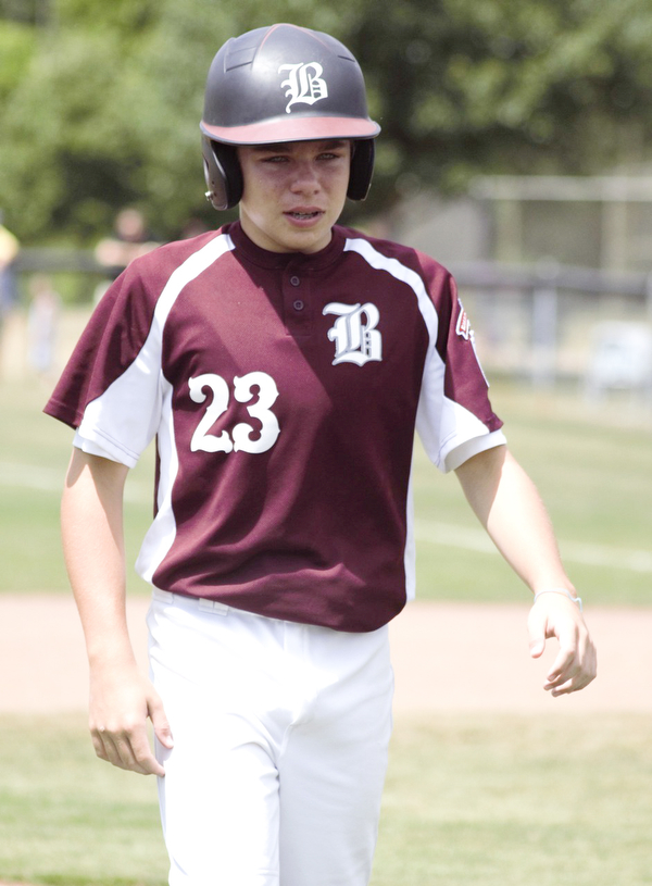 Dylan Barrett of the Boardman All-Stars walks off the field following a loss to New Albany in the Little League state championship game at North Canton Recreational Complex on Saturday afternoon.
 