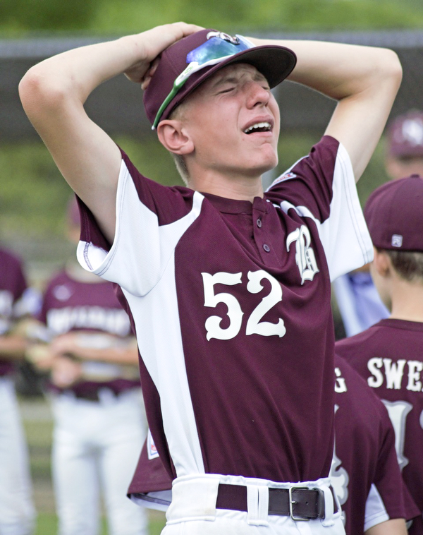 Jack Ericson of the Boardman All-Stars reacts to New Albany getting its medals following a loss in the Little League state championship game at North Canton Recreational Complex on Saturday afternoon.