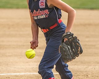 DIANNA OATRIDGE | THE VINDICATOR Austintown Fitch's Morgan Roby fires a pitch during the first inning of their 10 U tournament game versus Canfield in Tallmadge on Monday. Canfield won 18-4.