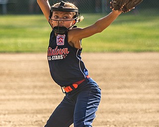 DIANNA OATRIDGE | THE VINDICATOR Austintown Fitch's Kali Ray delivers a pitch during their 10 U tournament game against Canfield in Tallmadge on Monday. Canfield won 18-4.